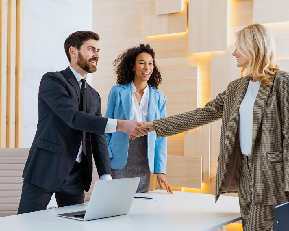 group-of-multiethnic-businesspeople-shaking-hands-for-a-business-deal.jpg group-of-multiethnic-businesspeople-shaking-hands-for-a-business-deal.jpg